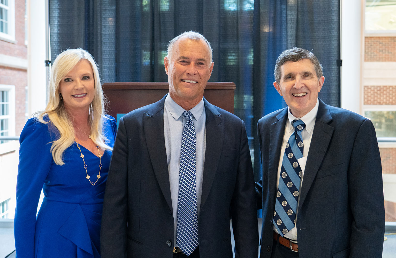 Dr. Richard and Angela Workman pose with Interim Dean Ed Swift