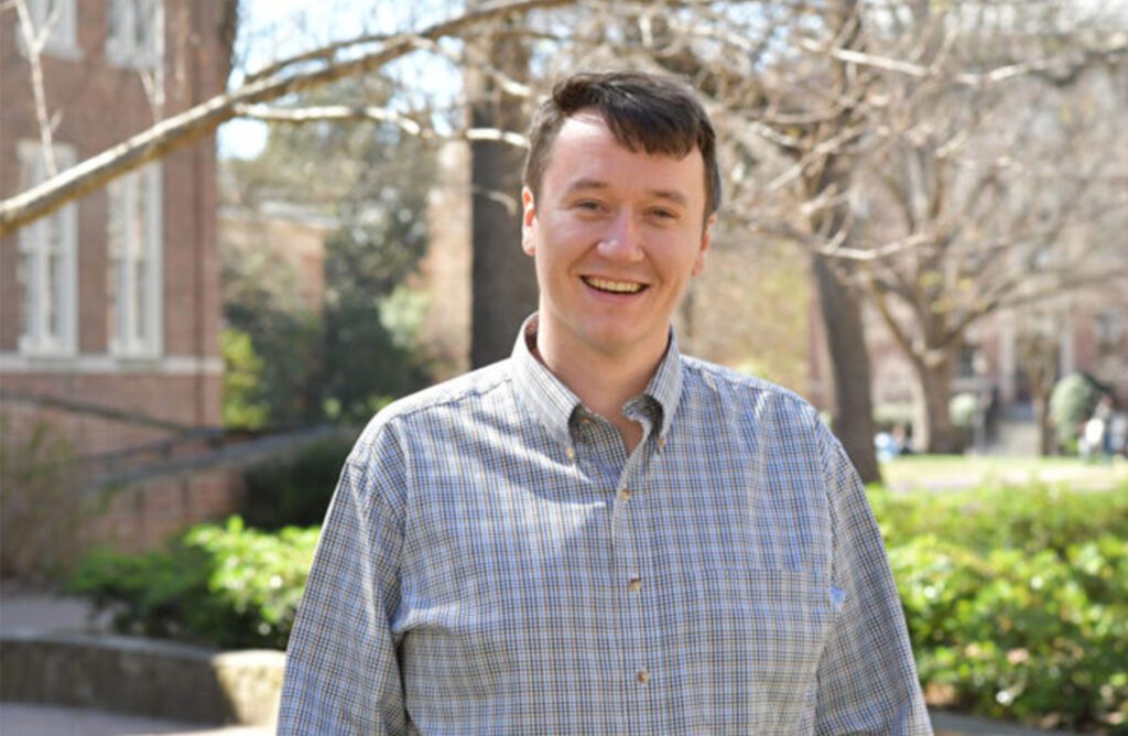 Hooper Schultz stands on campus at UNC