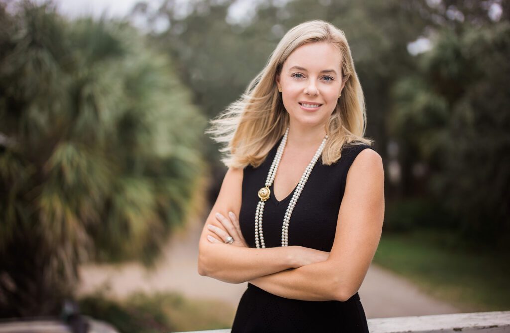 Kristy Woodson Harvey poses with arms crossed