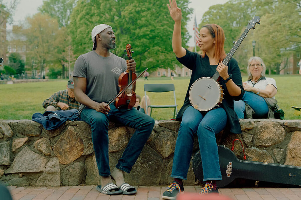 Giddens and Justin Robinson host a jam session outside of Wilson Library. (Photo by Jeyhoun Allebaugh)