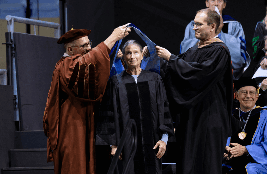 A doctoral candidate getting hooded.