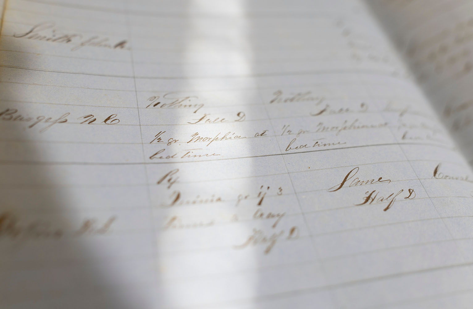 A close-up view of a 19th-century doctors' notes in a daybook from the Wilson Special Collections Library