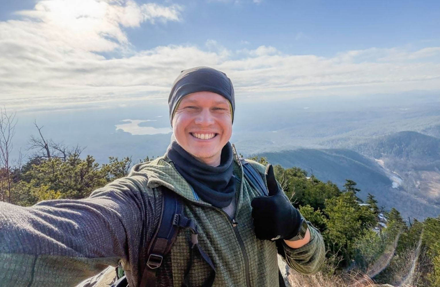 Jakob Wiedekind takes a selfie with the North Carolina mountains in the background