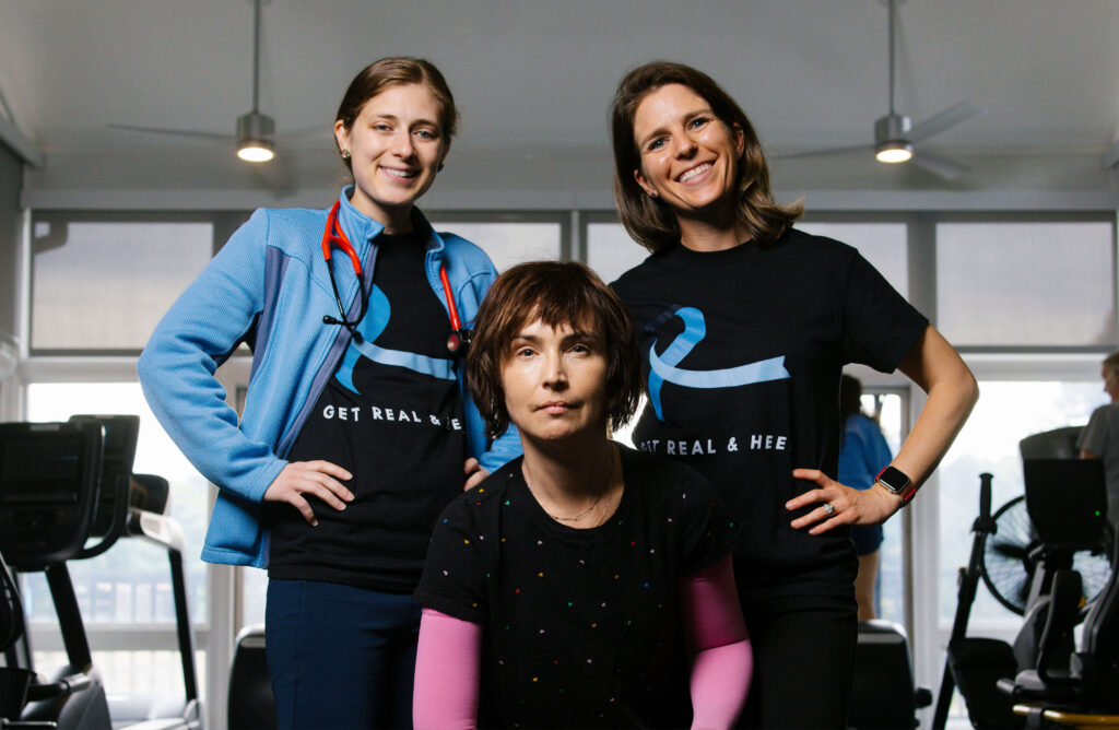 Eli Levene poses with Carly Bailey and Gabby Brennan at the Get Real and Heel gym.